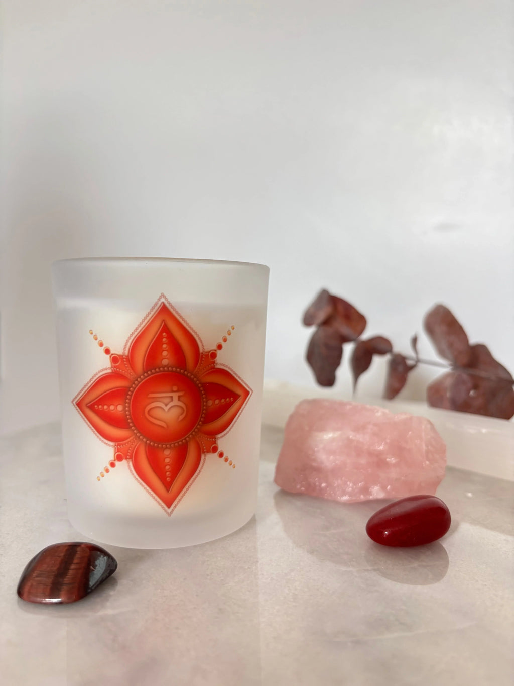 Root Chakra Balancing Candle made with natural rapeseed and coconut wax and pure essential oil blends. Hand-poured in an amber glass jar, this grounding aromatherapy candle supports balance, stability, and wellbeing while filling your home with a warm, earthy fragrance ideal for meditation, relaxation, and self-care rituals.
