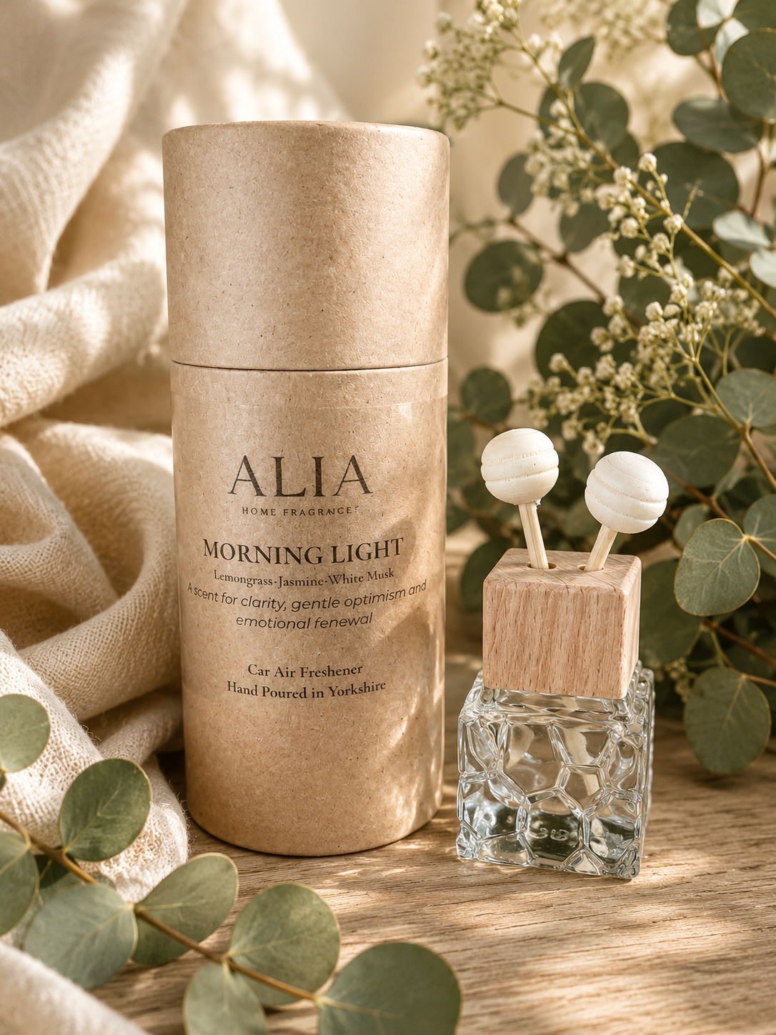 Morning Light Vent Clip Car Air Freshener with fresh citrus, white tea and soft musk fragrance designed to freshen vehicles through airflow from car vents.